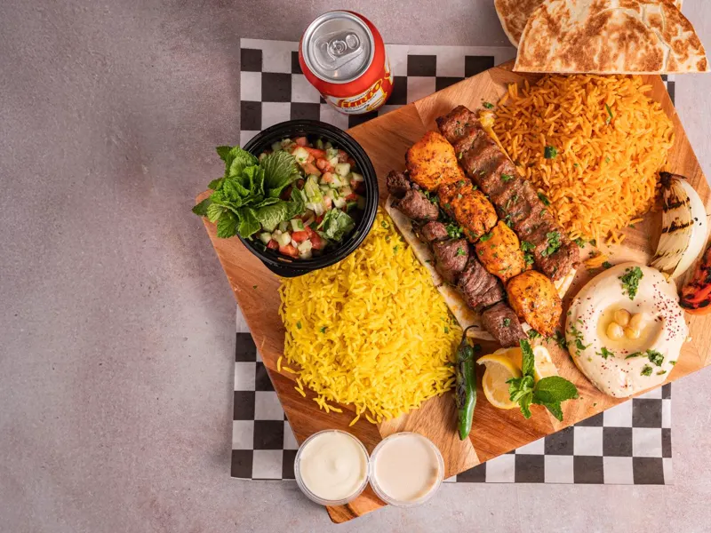Mixed grill plate — kafta, chicken and beef skewers over rice